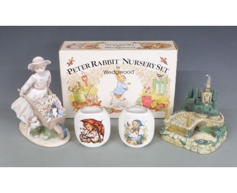 Wedgwood Beatrix Potter Peter Rabbit nursery set, Goebel Hummelscapes 'Going to Church', Hummel vases and a Nadal limited edi