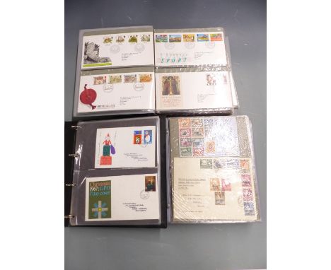 Four albums Jersey first day covers and a China 1993 stamp yearbook&nbsp;