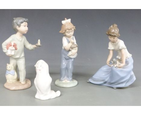 Seven Nao child figures, tallest 24cm