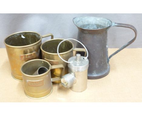 Arts and Crafts style copper jug with riveted handle, graduated set of three brass grain measures, height of tallest 11cm, Ev