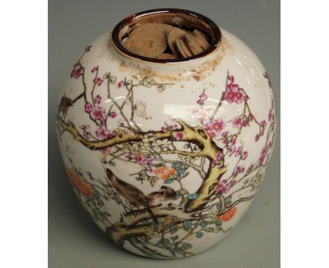 Chinese ceramic vase decorated with birds in a tree, filled solidly with coins, H15cm tall