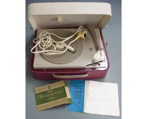 Phillips record player model type AG 2355/22, c1950s, in burgundy and grey Rexine finish, in original box with some paperwork