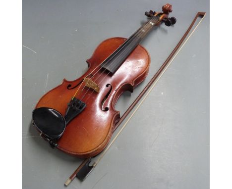 German violin c1900 labelled Antonius Stradivarius with 34cm two piece flame back, together with an Erich Steiner bow, 64cm l