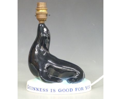 An original Carltonware Guinness seal advertising lamp Guinness is Good for You, H24cm