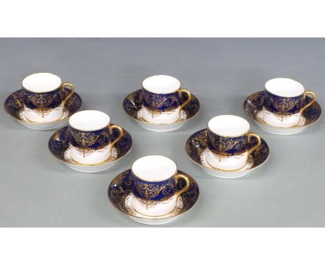 Six Cauldon gilded coffee cans and saucers