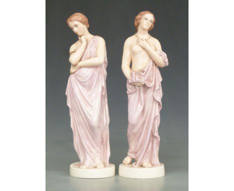 A pair of Belleek figurines Meditation and Affection, the&nbsp;standing female figures both in flowing pale pink lustre class
