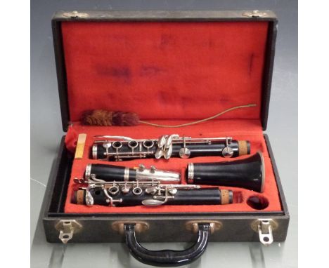 Rosewood clarinet, stamped 'foreign' no5383, with nickel mounts and keys, in original fitted case