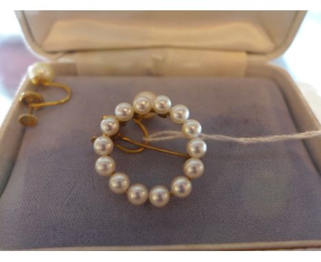 A 14ct yellow gold and pearl set brooch, together with matching earring