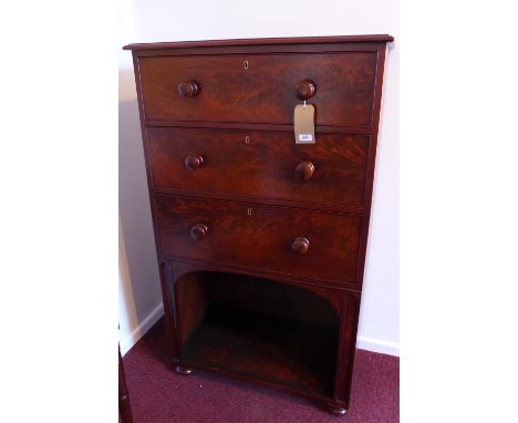 A Victorian mahogany hall chess with three drawers over shelf space and raised on bun feet, H:141cm W:84cm D:47cm