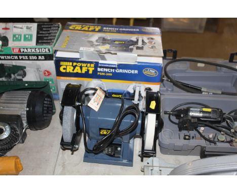 A Powercraft PSM-200 dual wheel bench grinder with original box, unused