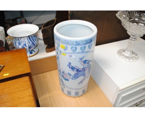 An Oriental patterned stick stand