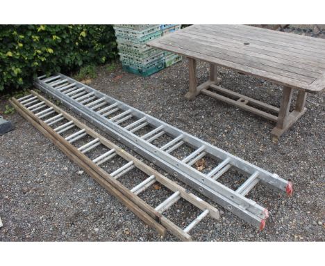 An aluminium extending ladder 