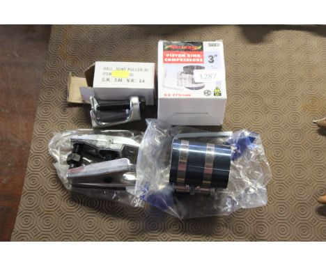 A Nielsen piston ring compressor (3"), a ball joint pillar etc. 