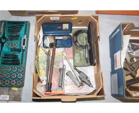 A box containing two cased measuring callipers, telescopic tools etc.