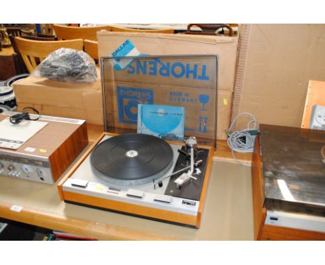 A Thorens TD125 turn table with box, manual and leads