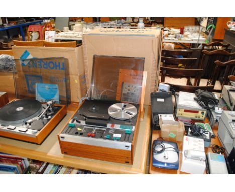 A Tandberg series 9000x reel to reel tape recorder with service manual, box and leads