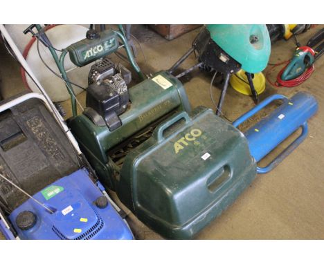 An Atco Balmoral 17S petrol cylinder lawnmower with rear roller