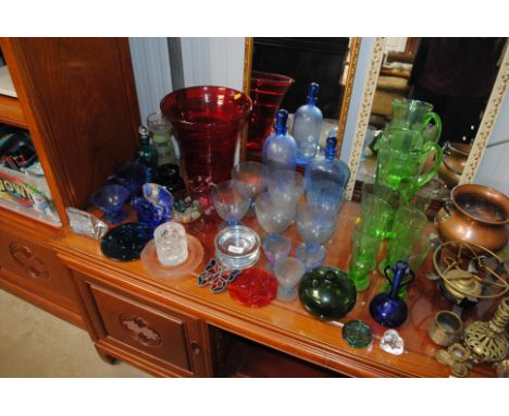 A large quantity of glassware including green tinted lemonade set, large ruby glass vase etc