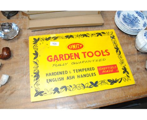 A wooden 'Garden Tools' sign