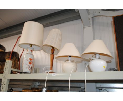 An Oriental style Imari table lamp and shade, a wooden table lamp and shade and two others