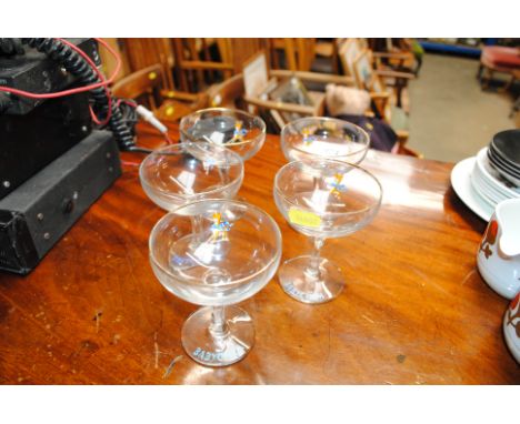 Five Babycham saucers 