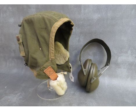 A US ARMY AIR CORPS FLYING HELMET A.9., and a pair of ear protectors