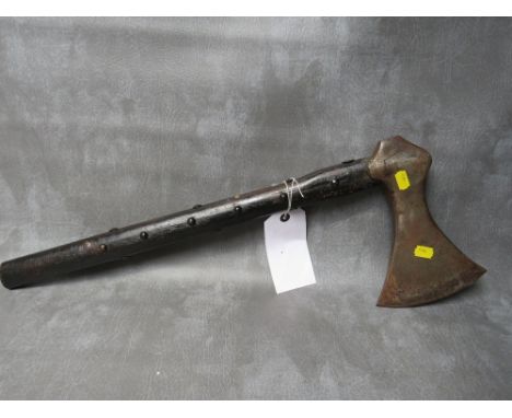 A REPLICA VIKING WAR AXE, an iron head in wooden handle with metal stud decoration to the shaft, L 58 cm