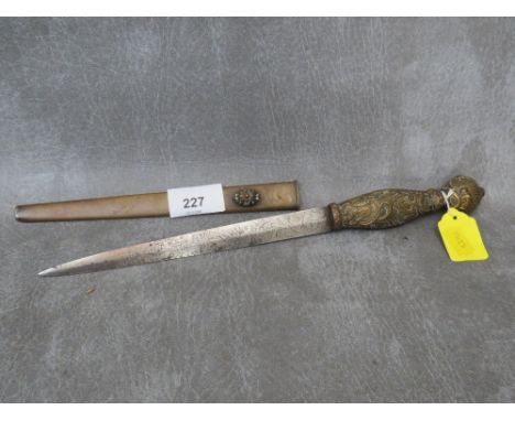 AN ANTIQUE ITALIAN STILLETO DAGGER, with engraved blade, brass grip and scabbard -&nbsp; Blade 19cm overall length 31 cm