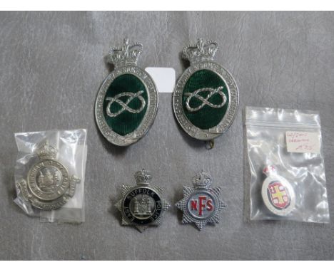 A COLLECITON OF POLICE RELATED BADGES, consisting of 2 Staffordshire &amp; Stoke On Trent Constabulary helmet plates, East Su