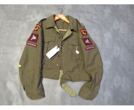 A BRITISH ARMY BATTLE DRESS BLOUSE BADGED SOUTH STAFFORDSHIRE AIRBOURNE 