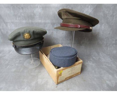 A BOXED VINTAGE W.R.A.F CAP, along with two US army peaked caps (3)