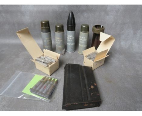 A TRAY OF VARIOUS INERT EX TRAINING ROUNDS ETC., to include rubber bullets, boxed Russian 7-26 drill rounds, German WW2 incen