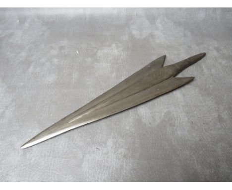 AN ANTIQUE BLACKSMITHS MADE HARPOON TIP, of arrow form, with pointed tangs, the central rib with incised decoration, L 43 cm