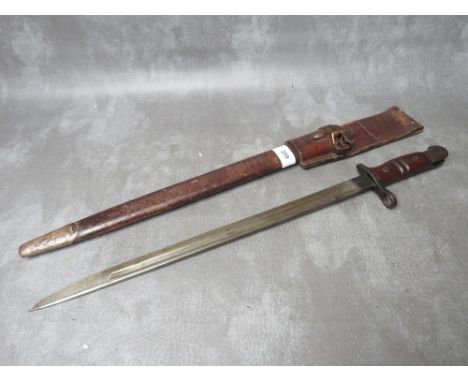 A REMINGTON 1913 BAYONET, with issue mark 3 17, with wooden grooved grip, in scabbard with leather frog