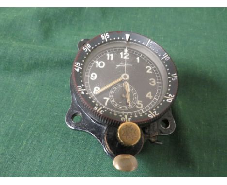 A WW2 GERMAN JUNGHANS AIRCRAFT COCKPIT CLOCK, signed to dial, rotating bezel with front winder and reset button