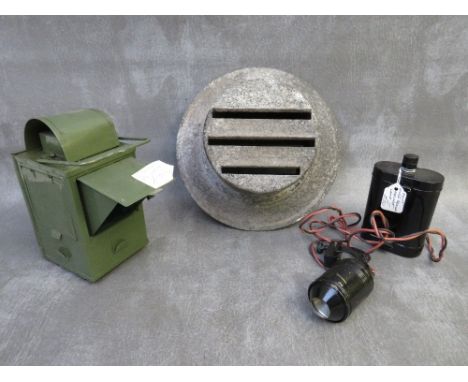 A WWII RESCUE HELMET LAMP, a green painted lantern and a WW2 blackout headlight cover