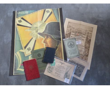 A SMALL COLLECTION OF WWII GERMAN EPHEMERA &amp; BOOKS, to include voluntary work pass, workbook with contribution stamps, la