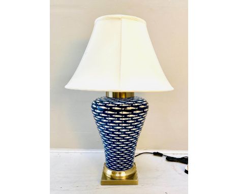 TABLE LAMP, 74cm high, 50cm diameter, blue and white ceramic with fish design, shade. 