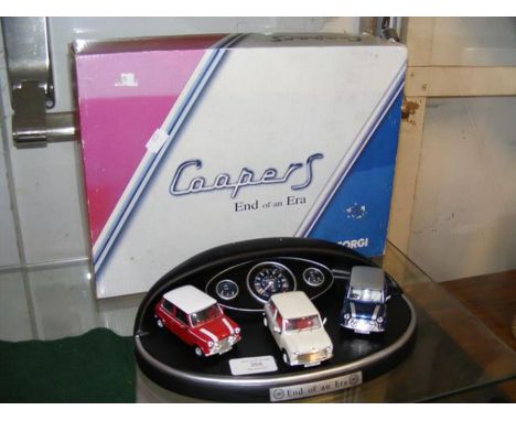 A Corgi boxed Cooper S 'End of an Era' set, comprising three vehicles on stand