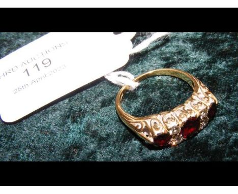 A ruby and diamond ring in 18ct setting