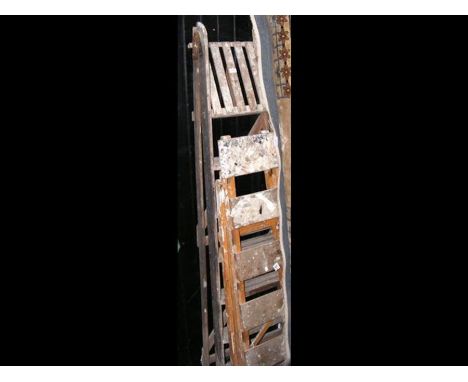 Two vintage step ladders