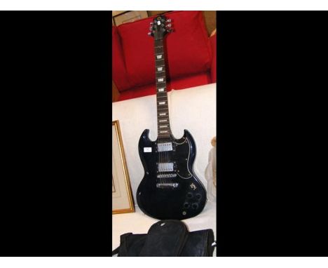 An electric guitar in soft carrying caseCONDITION REPORTNo make or model visible.We would not post this guitar, as it hasn't 