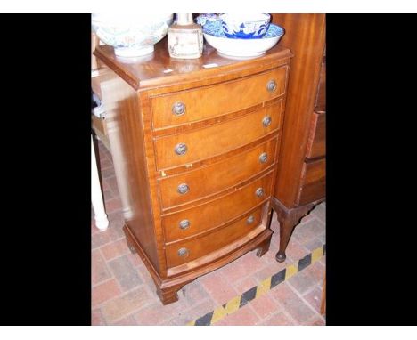 A small proportioned bow front chest of five drawers - width 53cm 