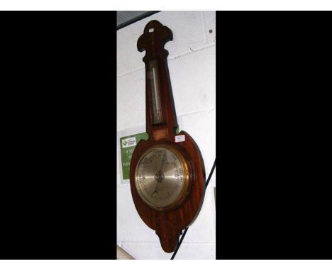 An F. Barker &amp; Son wall barometer with inlaid surround