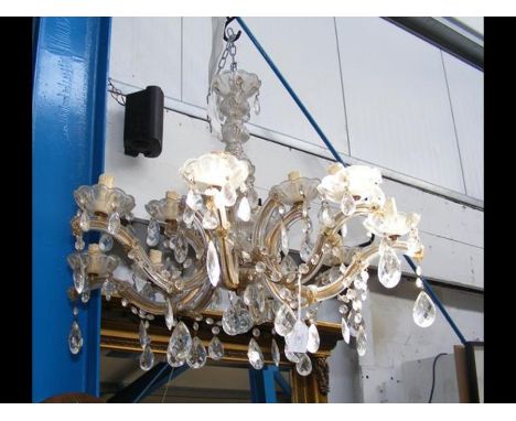 An attractive antique eight branch crystal drop chandelier  