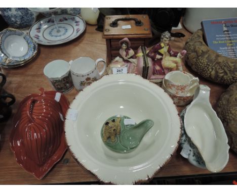 A selection of vintage ceramics including Wade pipe holder