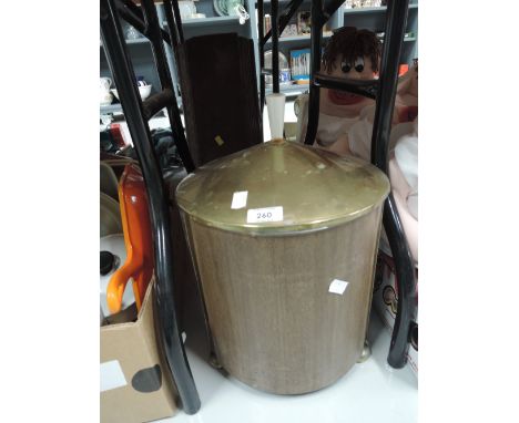 A vintage wooden and brass lidded container