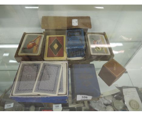 A selection of vintage playing cards and card games 