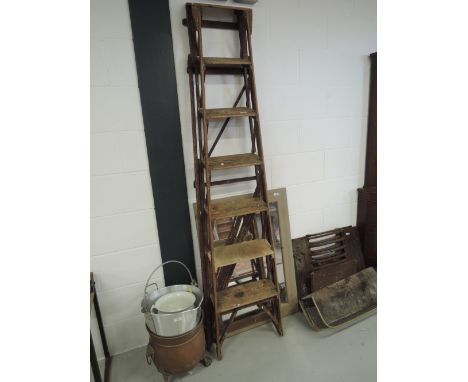 A set of vintage wooden step ladders