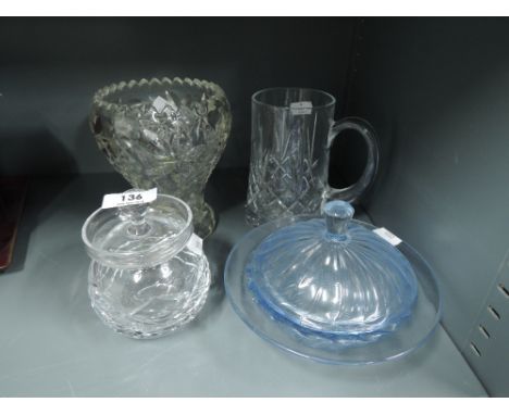 A selection of vintage clear cut and light blue glass wares